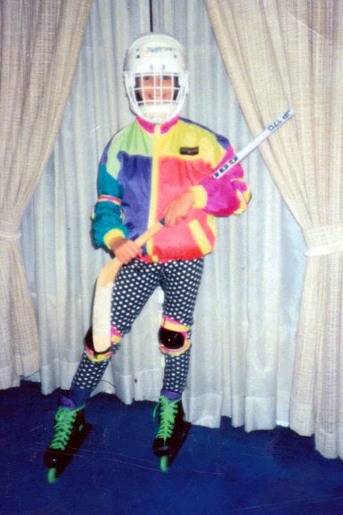 Kristen Doute wearing roller hockey gear as a young girl.
