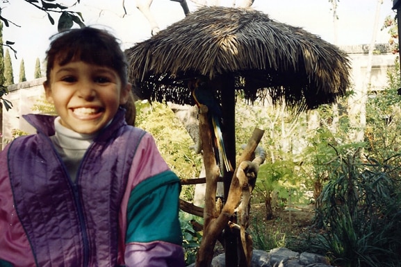 Scheana Shay smiles while hanging out in front of some monkeys.