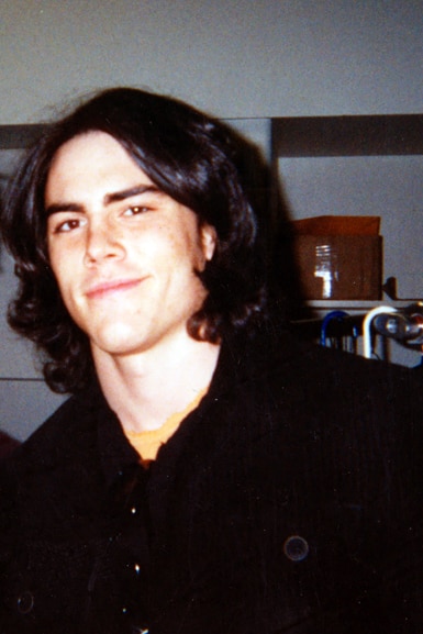 Tom Sandoval with long hair.