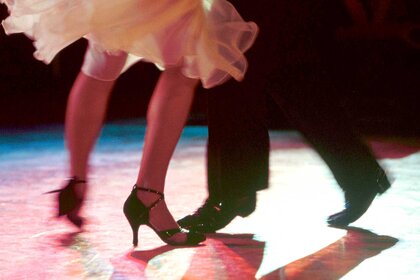 couples feet while ballroom dancing