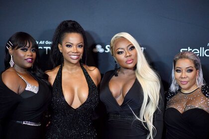 Musical group xscape at an event
