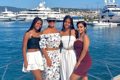 Gizelle Bryant and her daughters, Angel Bryant, Grace Bryant, and Adore Bryant pose together for a photo.