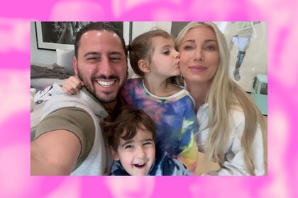 Josh Altman and his wife and two kids pose for a family selfie together.