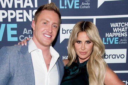 Kim Biermann poses with husband Kroy on Watch What Happens Live