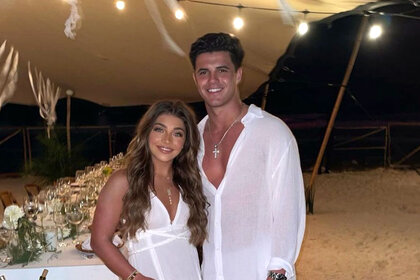 Gia Giudice and Christian Carmichael pose for a photo together while on vacation in Mexico in January 2023.