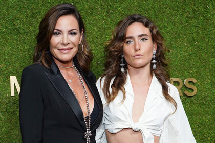 Luann de Lesseps and Victoria de Lesseps pose for the camera during an event