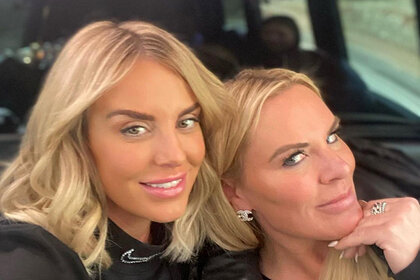 Heather Gay and Whitney Rose take a selfie together in a sprinter van.