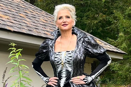 Dorinda Medley of The Real Housewives of New York City poses in a skeleton dress.