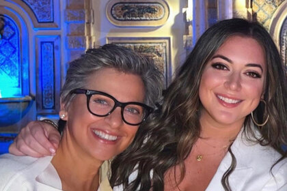 Caroline Manzo and Lauren Manzo posing and smiling together.