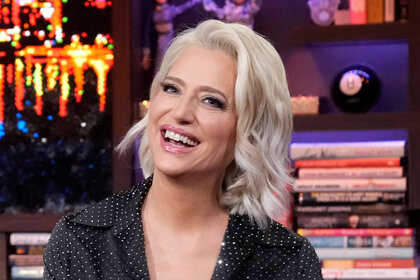 Dorinda Medley laughing and sitting at the Watch What Happens Live clubhouse.