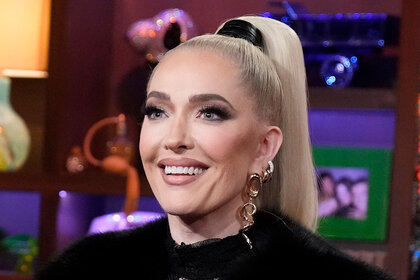 Erika Jayne smiling at the Watch What Happens Live clubhouse.