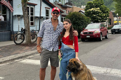 Portia Umansky with her father Maricio Umansky and their dog in Aspen.