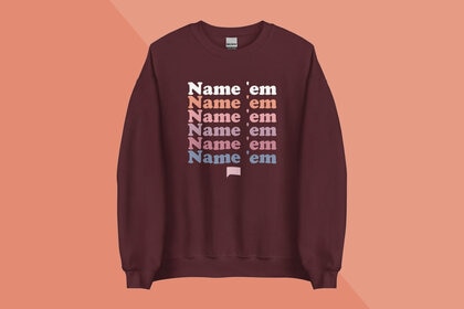 A brown sweatshirt with "Name 'em" repeated on it overlaid onto a colorful background.