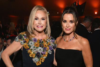 Kyle Richards and Kathy Hilton posing together at an event.