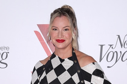 Hannah Ferrier wearing a black and white dress at a Virgin Voyage event