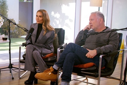 Dorit Kemsley and Paul Kemsley seated next to each other during an interview.