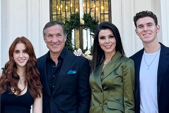 Max Dubrow, Terry Dubrow, Heather Dubrow, and Nick Dubrow of The Real Housewives of Orange County smile together in front of their home.