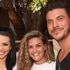 Scheana Shay, Jax Taylor, and Brittany Cartwright smiling together.