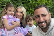 Josh Altman smiling with his family in their backyard.