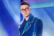 Christian Siriano wears a blue suit in Project Runway Season 20 All Stars