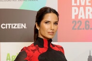 A headshot of Padma Lakshmi on the red carpet with slicked back hair