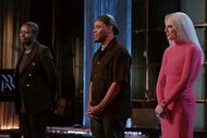 Project Runway Finalists Brittany Allen, Bishme Cromartie, and Laurence Bass on stage at the Project Runway Finale for Season 20.