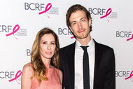 Carole Radziwill and Adam Kenworthy pose for a photo together.