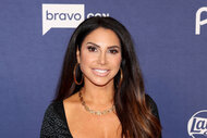 Jennifer Aydin in front of the step and repeat at Bravocon 2023.
