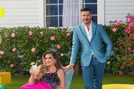 Brittany Cartwright and Jax Taylor on a grass lawn together