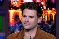 Tom Schwartz sitting at the Watch What Happens Live clubhouse in New York City.