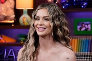 Lala Kent smiling as she sits as a guest on WWHL.