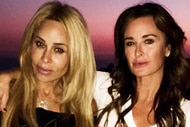 Kyle Richards and Faye Resnick posing together in front of a sunset.
