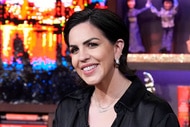Katie Maloney smiling at the Watch What Happens Live clubhouse in New York City.
