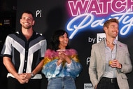 Jesse Solomon, Danielle Olivera, and Kyle Cooke smiling in front of a step and repeat.