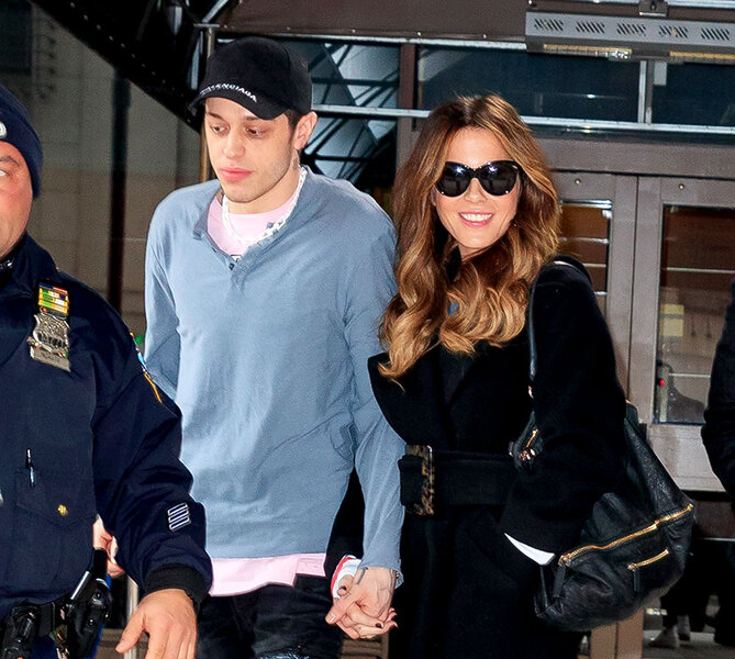 Kate Beckinsale and Pete Davidson walk hand-in-hand in New York City.