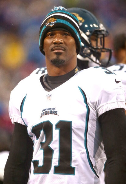 Aaron Ross of the Jacksonville Jaguars looks on from the sideline during an NFL game