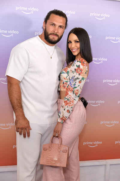 Scheana Shay and Brock Davies pose for a photo together.