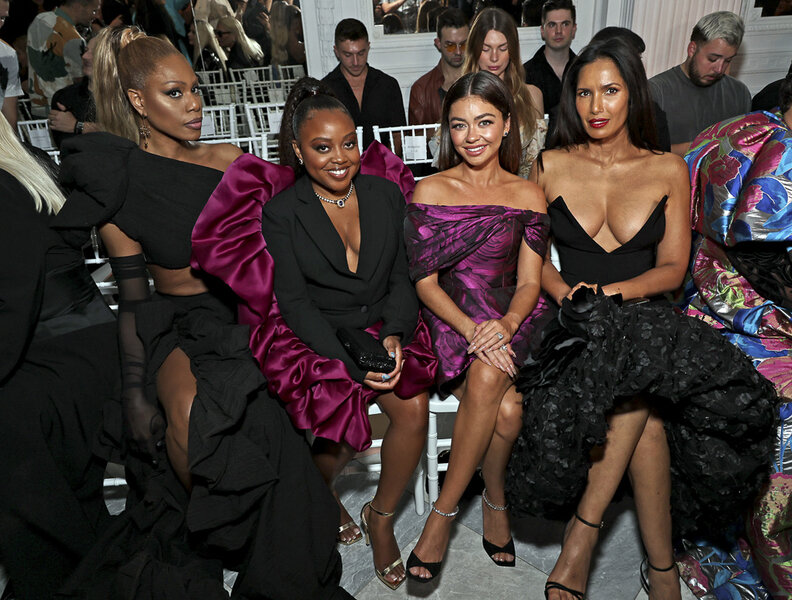 Quinta Brunson, Sarah Hyland, and Padma Lakshmi seated next to each other at Christian Siriano's Spring 2024 New York Fashion Week show.