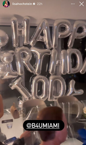 Lisa Hochstein shows silver "Happy Birthday Jody" balloons in front of a window. Overlaid text, "@b4umiami".