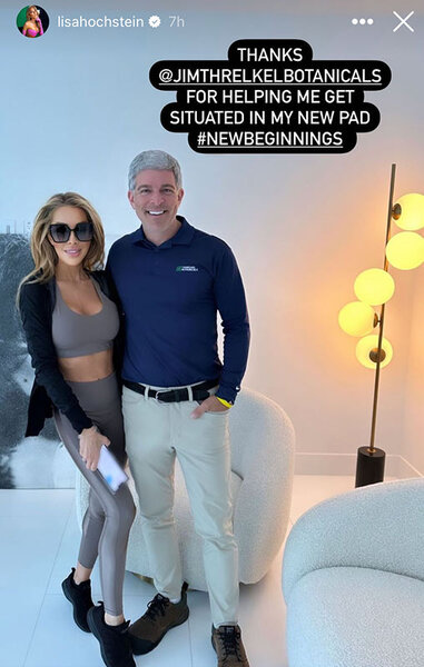 Lisa Hochstein poses in athleisure and sunglasses inside of her new home with Jeff Sophir. Overlaid text, "Thanks @jimthrelkelbotanicals for helping me get situated in my new pad #newbeginnings."