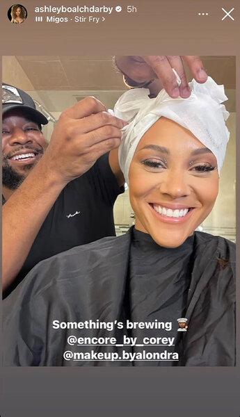 Ashley Darby of The Real Housewives of Potomac smiles with her hair stylist Corey.