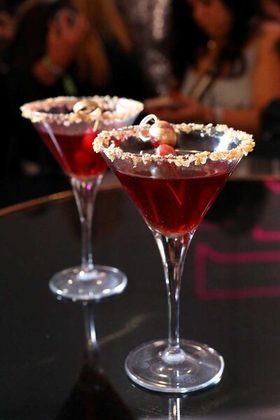 Red cocktails in a martini glass offered at BravoCon 2023