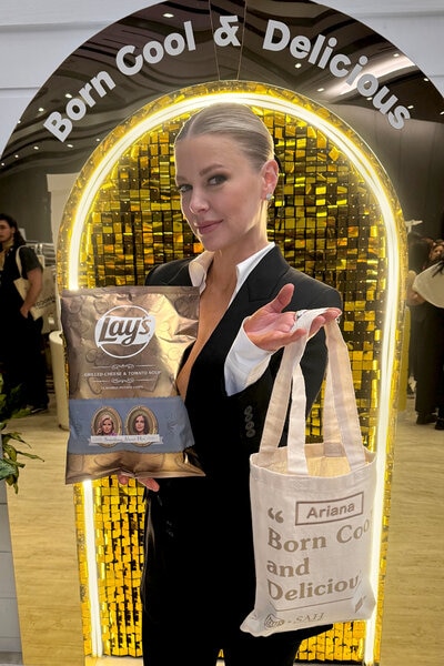 Ariana Madix at the Something About Her by Lay's booth at Bravocon 2023.