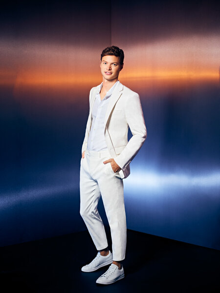 Will Kulp of Southern Hospitality Season 2 wearing a white pant suit.