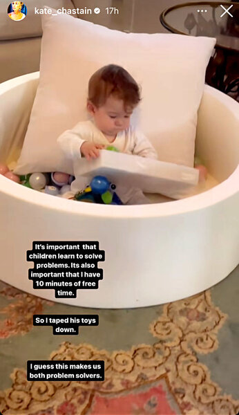 Kate Chastain's son playing in a ball pit.