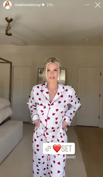 Madison LeCroy wearing pajamas with red hearts on them.