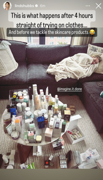 Lindsay Hubbard takes a nap on her couch with skincare products on her coffee table