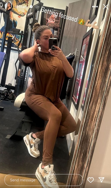 Brittany Cartwright wearing brown leggings and brown tee shirt while at the gym