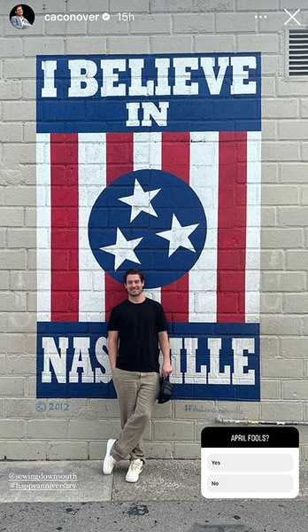 Craig Conover standing in front of a mural wall in Nashville, Tennessee.