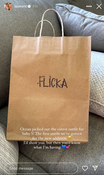 A brown bag with a child's outfit inside, purchased by Lala Kent.